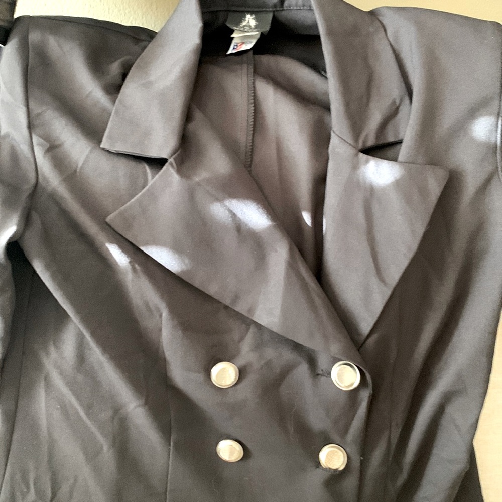 Jared’ Blazer with silver buttons.